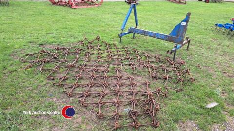 Mounted chain harrows
