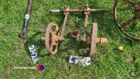 Pair of small cast implement wheels with axles