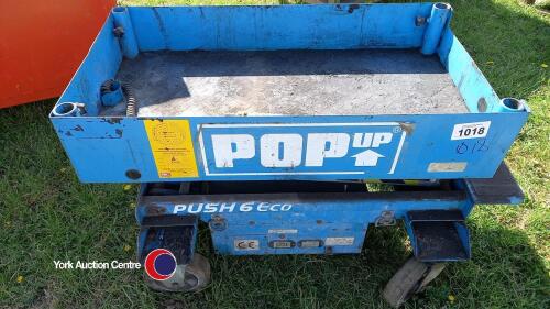 Electric pop-up scissor lift