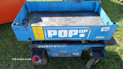 Electric pop-up scissor lift