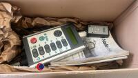 McHale 998 wrapper with round bale and static wrapping kits, controls and manuals in office, 2014 - 10