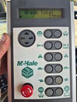 McHale 998 wrapper with round bale and static wrapping kits, controls and manuals in office, 2014 - 11