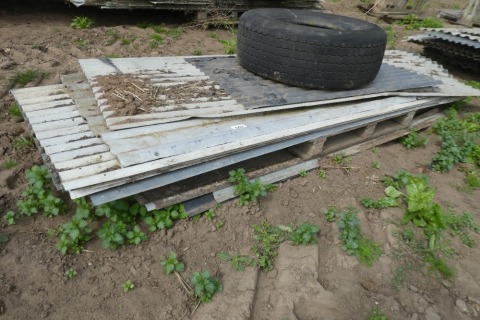 Pallet of mixed corregated roof sheets
