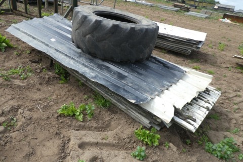 Pallet of mixed corregated roof sheets