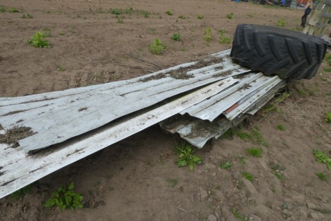 Pallet of corrugated roofing sheets, mixed