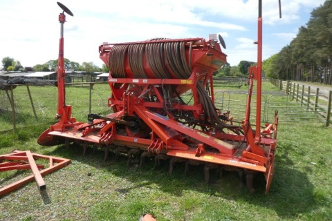 2010 Kuhn Venta LC402 drill mounted on a 2018 Kuhn HR4004 power harrow with packer roller c/w marker arms, Q-fit tines