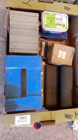 Mixed box including screws, wet stones, chain and saw files