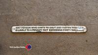 Vintage cast iron gate signs.