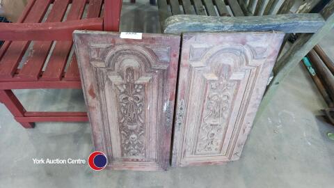 Carved wooden panels