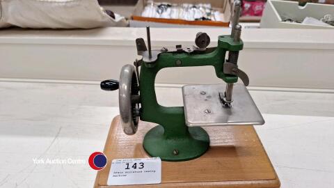 Grain miniature sewing machine