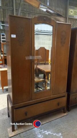 Large mirrored carved detailed wardrobe