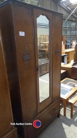 Small mirrored carved detailed wardrobe