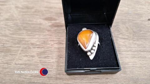 Silver ring with amber butterscotch stone