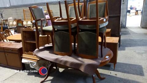 Oval wooden dining table with 4 dining chairs plus carver chair