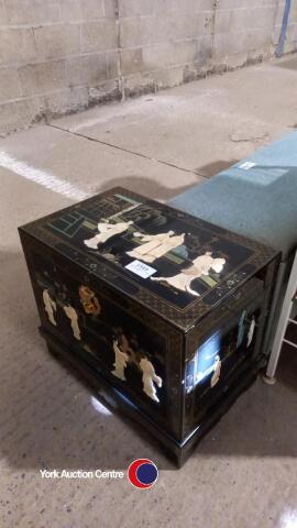 Ornate oriental storage box on stand