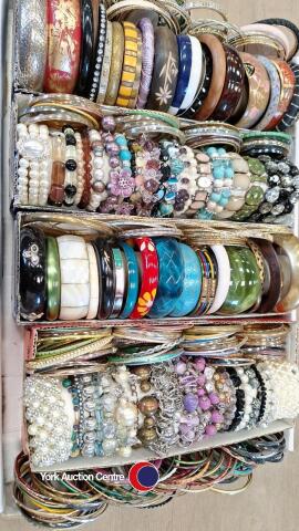 Large tray of bangles and bracelets