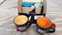 4 x black coffee mugs with coloured inner and matching spoon
