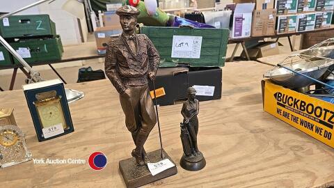 2 x golf figurines