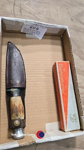 The Bandmaster Fancy harmonica in original box and vintage bone handled knife in leather belt holder case