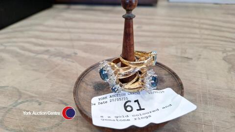 8 x gold coloured and gemstone rings