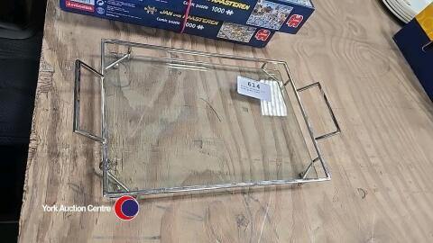 Silver coloured tray with glass base
