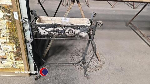 Ornate iron plant stand