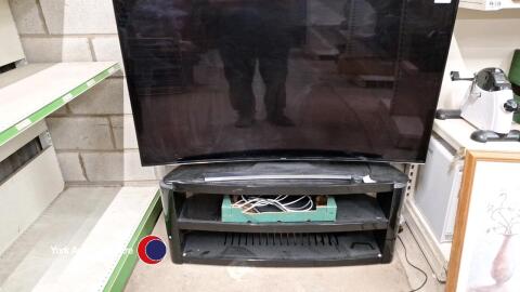 Samsung 65in curve screen TV plus TV/DVD unit and TV boxes/remotes
