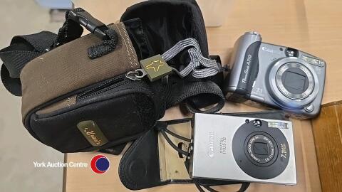 Canon powershot A710 digital camera plus canon 1 US70 digital camera