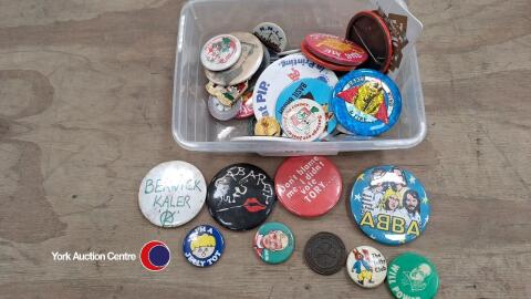 Box of vintage badges
