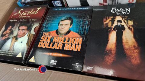 Box of assorted DVD box sets