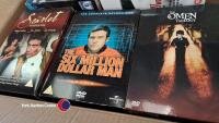 Box of assorted DVD box sets