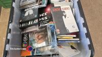 Quantity of assorted CD's and DVD's - 2
