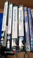 Quantity of DVDs including box sets plus DB Power portable DVD player and charger - 2