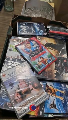 Box of various DVDs, some still sealed