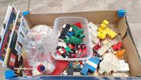 Box of vintage Lego and instruction manuals