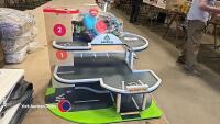 Toy garage with box of cars and toys