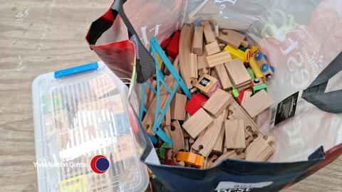 Large selection of wooden train track and box of wooden blocks