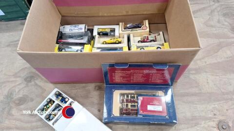 Box of boxed diecast cars