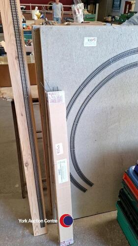 Hornby flexible train tracks on 2 boards with box of additional track