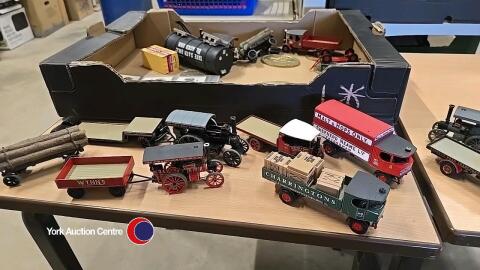 Box of die cast trains and wagons