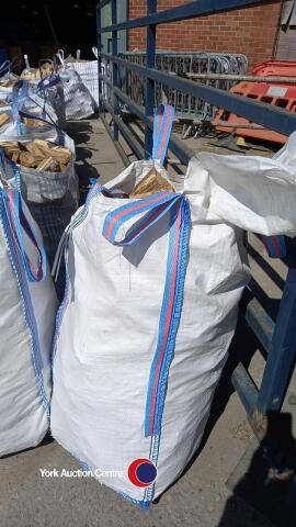 Assorted sized oak fire wood in barrow bag