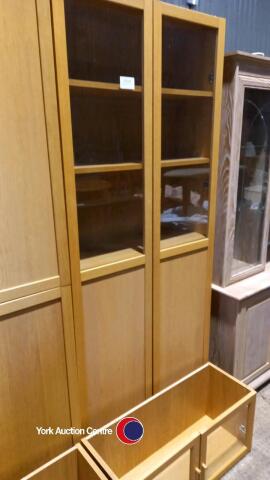 Tall bookcase with glass doors