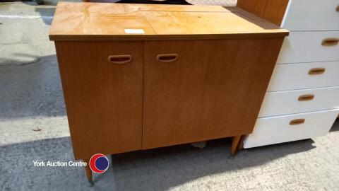 Vintage sewing machine cabinet on legs