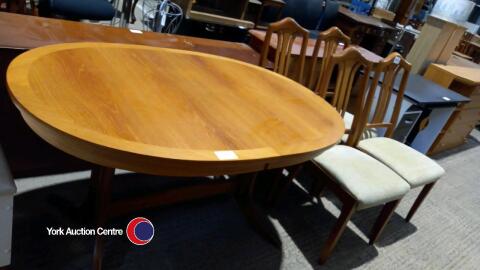 Oval Nathan dining table with 4 dining chairs