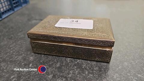 Tin of jewellery