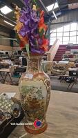 Tall vase with artificial gladioli