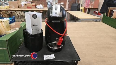 Nescafe Genio coffee machine including instruction manual and shelf container for coffee pods