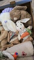 Various rabbits including door stop and soft toys