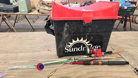 Fishing rods with reels and tackle box