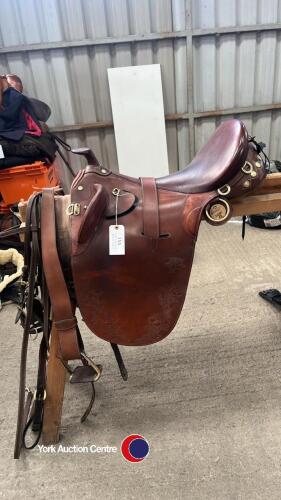 Excellent quality leather Australian cob saddle and bridle ect. Beautifully worked in brown leather with brass fittings. Used three times. In excelle